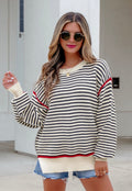Cream and Black sweater with Red Trim