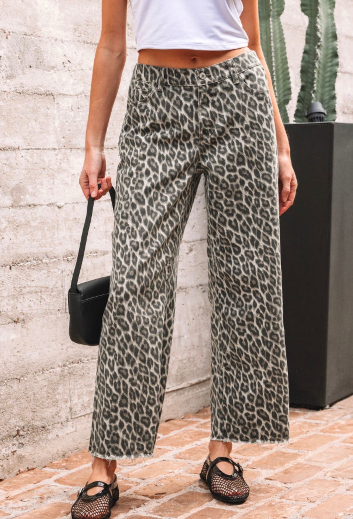 Women's Cheetah Jeans with Frayed Bottom