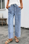 Women's Light Blue Jeans with Frayed Bottoms