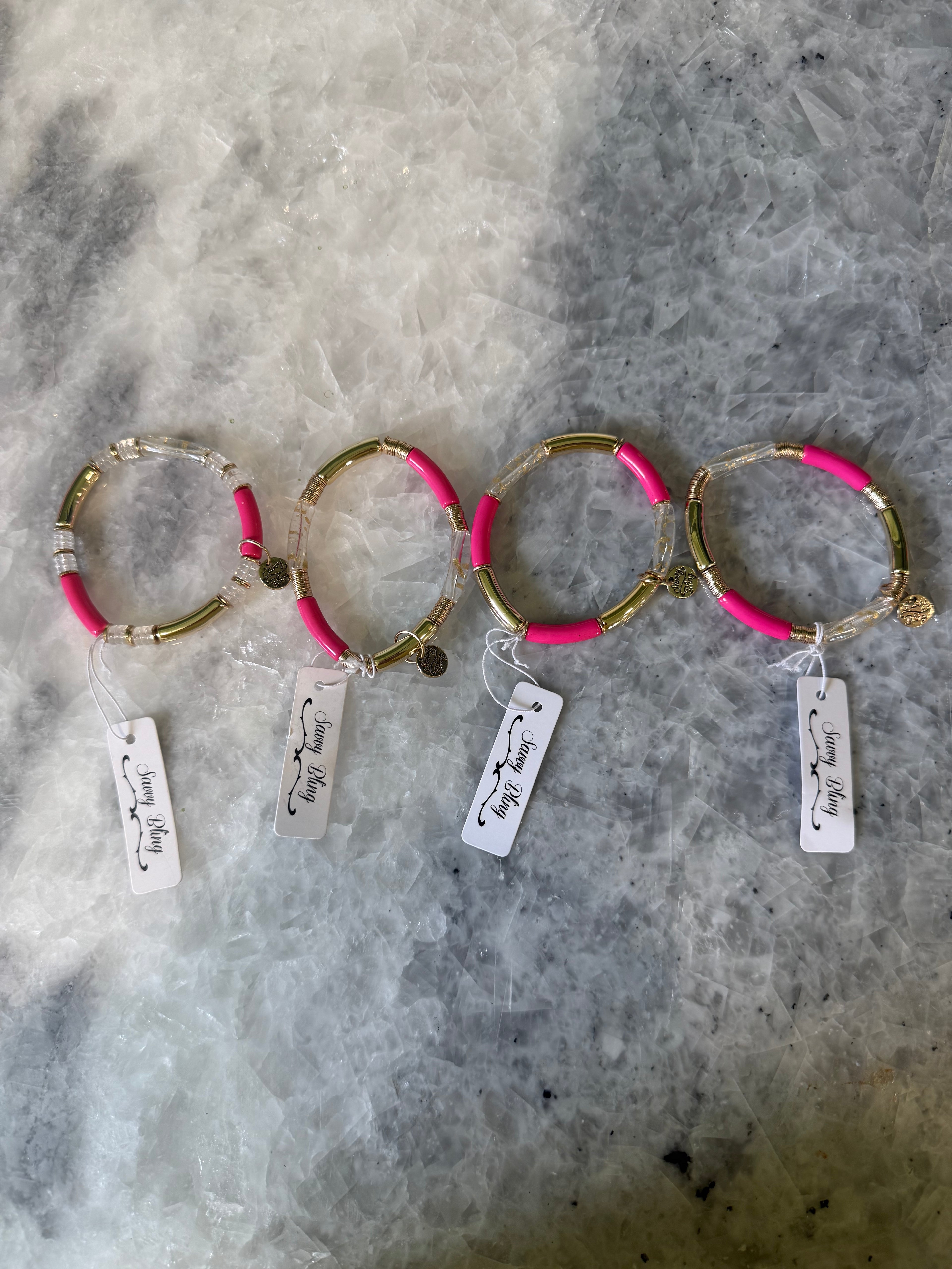 Hot Pink, Gold, and White Bracelets